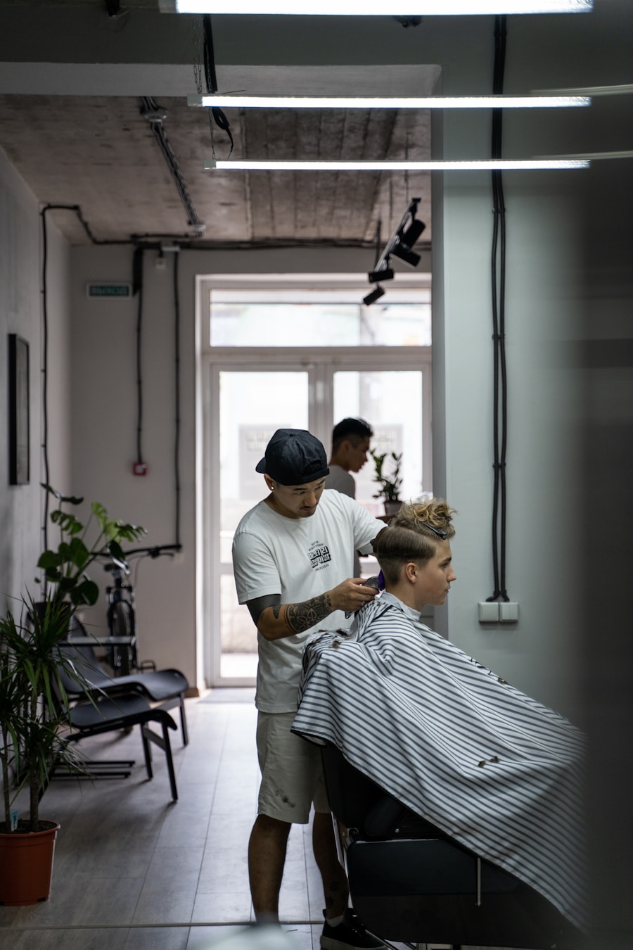Myank, barber at Kam's Fade